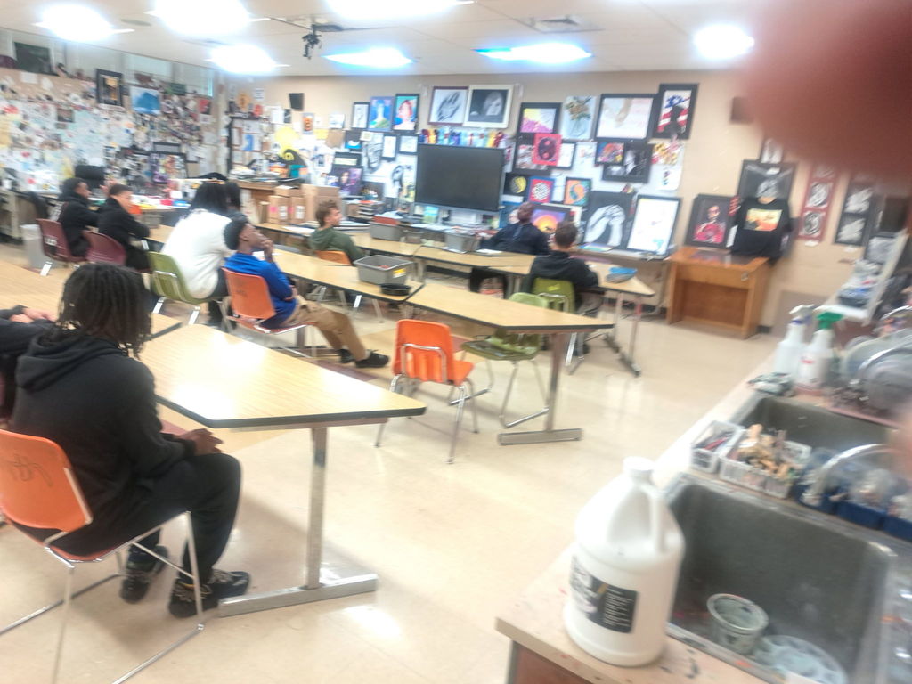 Officer Sykes speaking to the young men