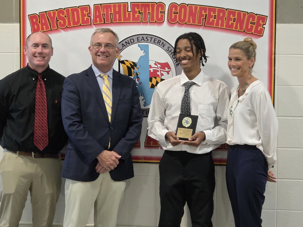 Elijah with Mr. Bromwell and Mrs. Monar receiving his award