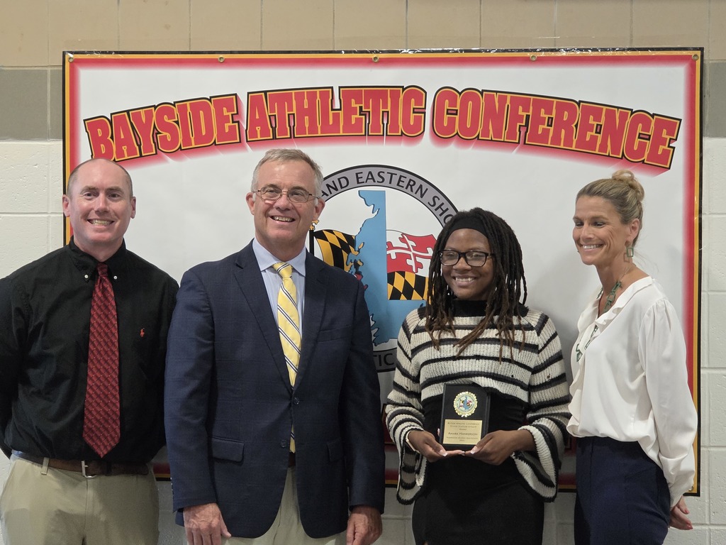 Amara with Mr. Bromwell and Mrs. Monar receiving her award