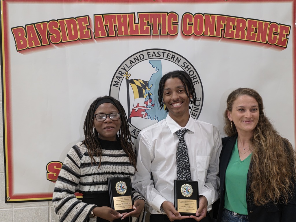 Elijah and Amara with Coach Henderson