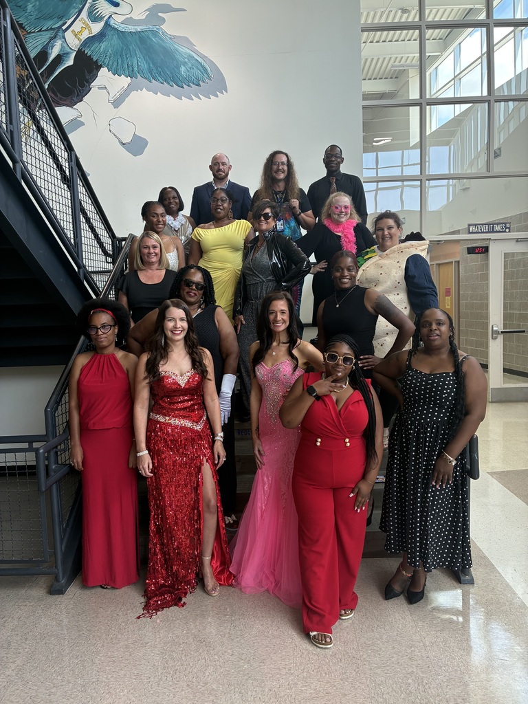 educators dressed for red carpet