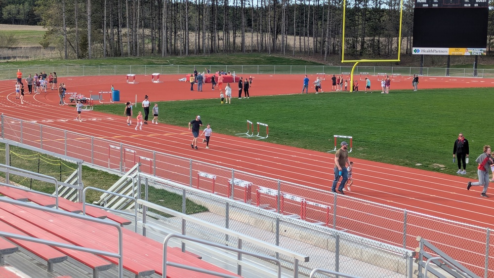 students running on track