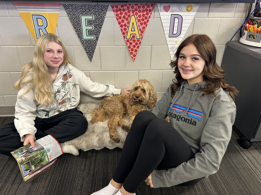 8th grade reading session with furry friend Cooper was pawsome!