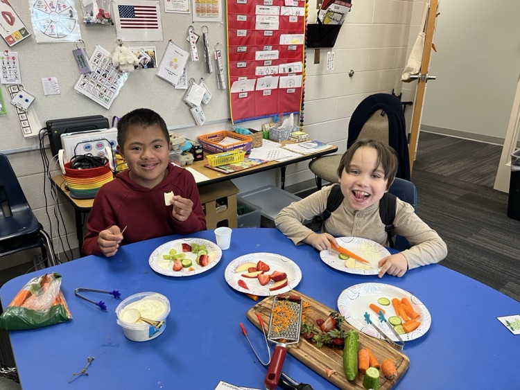 Students used cooking tools and explored different colors, smells, textures, and dip while building communication and fine motor skills.