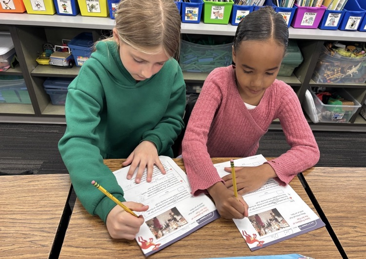 Mrs. Andersen’s 2nd graders are putting their teamwork skills to work as they solve word problems with numbers within 1,000. 