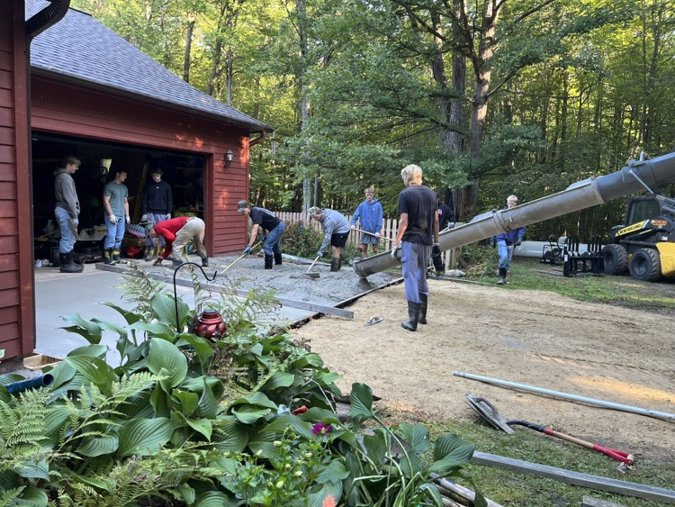 Students in Mr. Herink’s Building Construction Class gained valuable, hands-on, real-world experience yesterday as they poured a concrete apron for a community member.