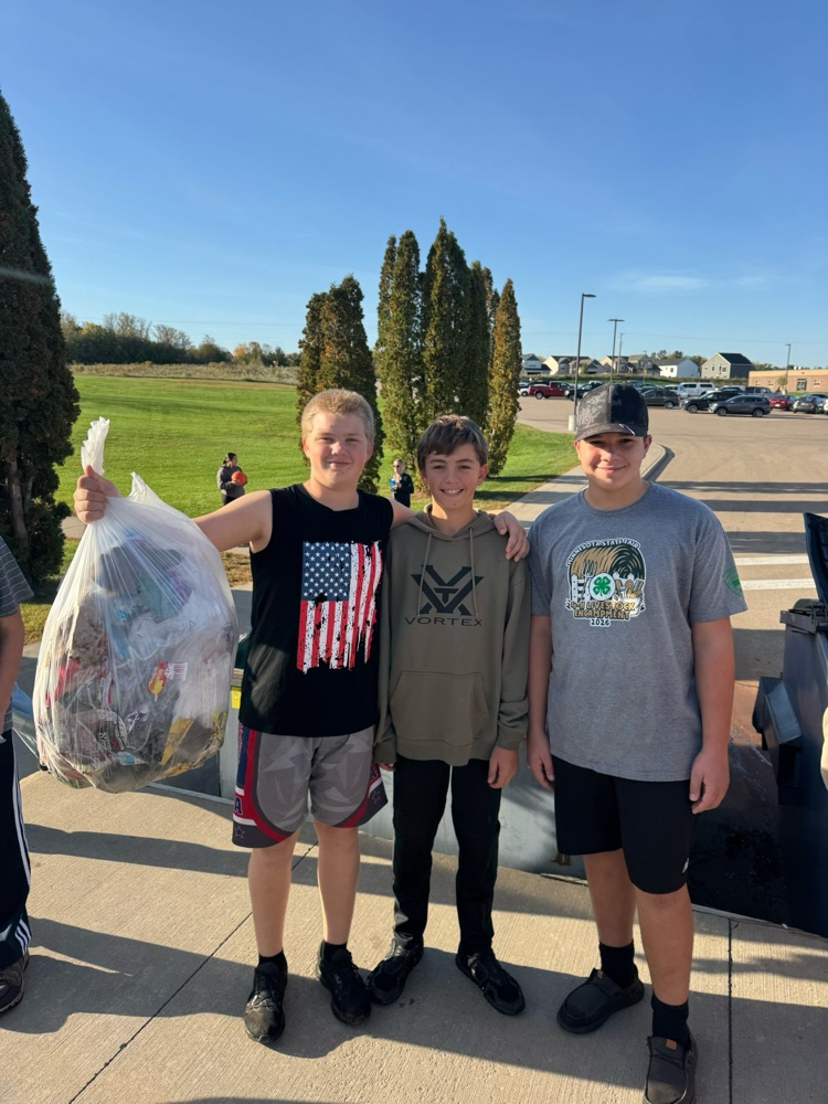 Our 8th grade boys spent the morning giving back by cleaning up campus and the community! 