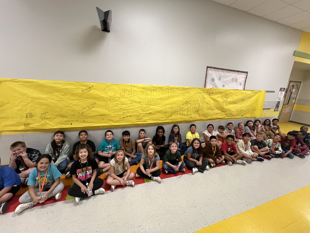 Somerville 3rd graders writing down what they're thankful for