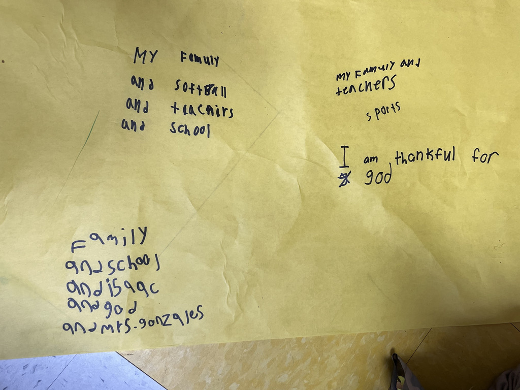 Somerville 3rd graders writing down what they're thankful for