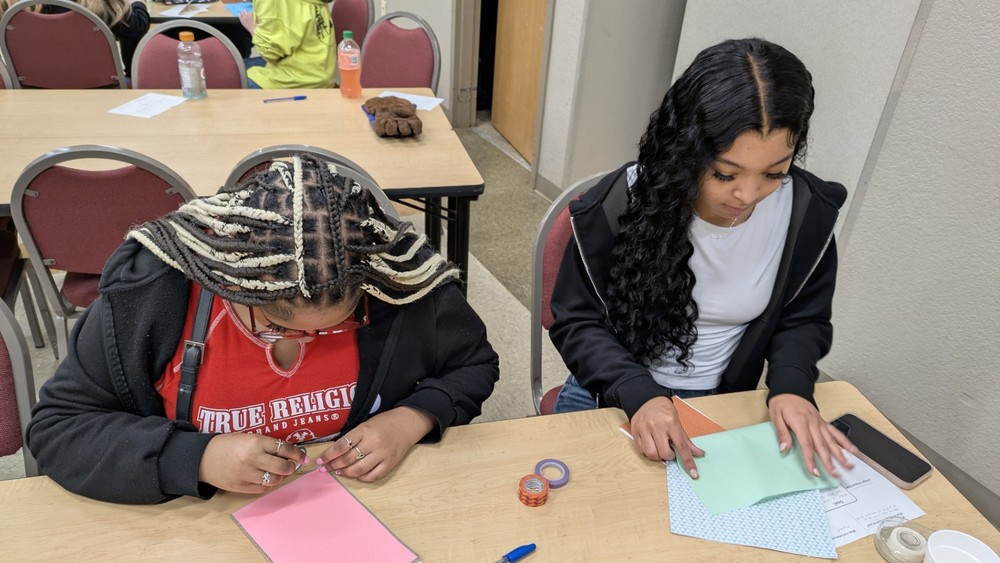 Members of the SkillsUSA chapter at South Arkansas College create handmade Christmas cards for residents at Hudson Memorial Nursing Home