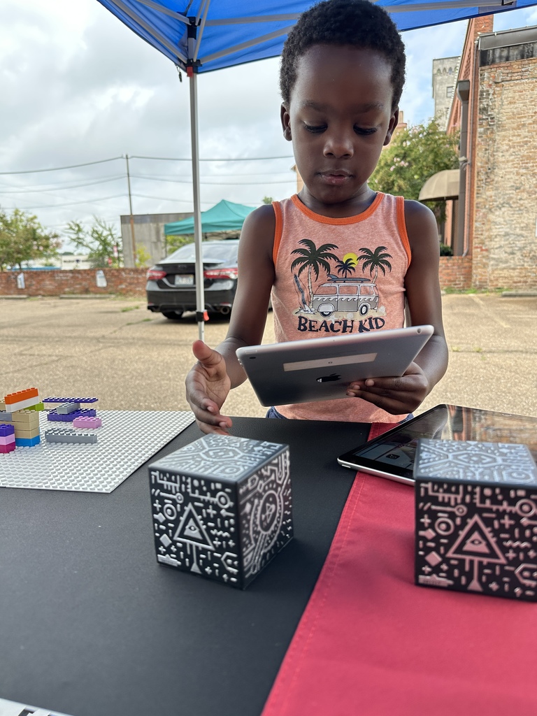 Child playing with merge cubes
