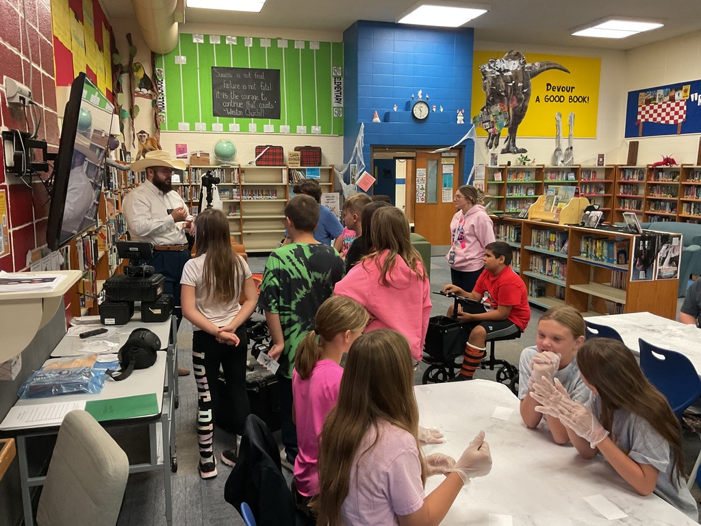 Mrs. Spencer's library classes were treated to some special guests who helped them understand investigative techniques.