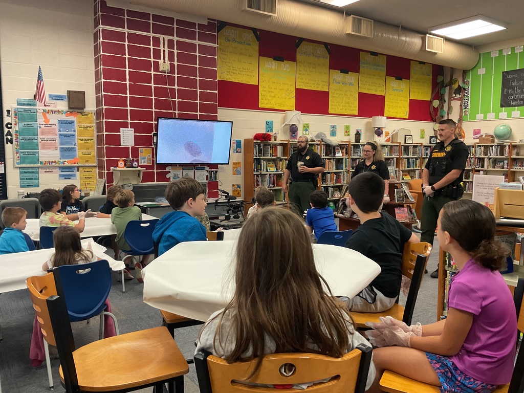 Mrs. Spencer's library classes were treated to some special guests who helped them understand investigative techniques.