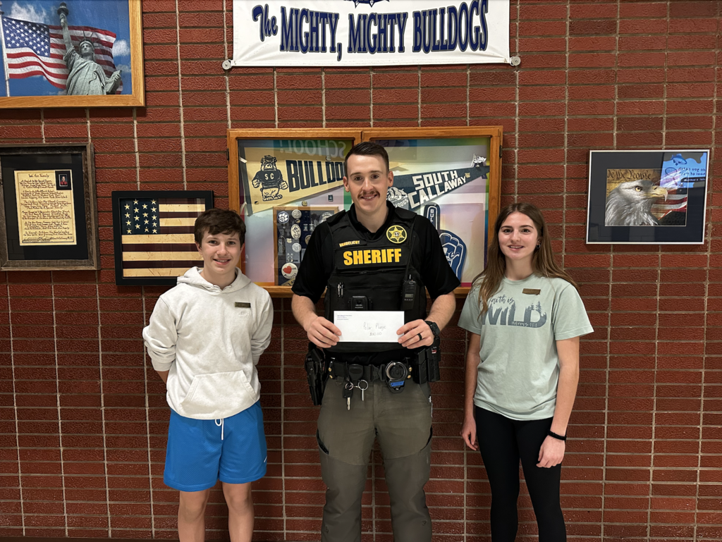 Middle School Students Help SRO Take the Polar Plunge! The South Callaway Middle School Student Council recently hosted Hat Days and donated 30% of their chocolate sales from the week of March 2nd to support a great cause. Because of the generosity of our students and staff, they were able to donate $150 to our School Resource Officer, Officer Cody Vandelicht, for his Polar Plunge Challenge on Friday. Anyone wishing to add to the students' total can go to https://bit.ly/4aAhduv to make their own donation! All of the money he raises will go to support the Special Olympics, helping provide opportunities for athletes with intellectual disabilities to compete, grow, and shine. Thank you to everyone who participated and helped make a difference. We’re proud of our students for supporting such an important cause!