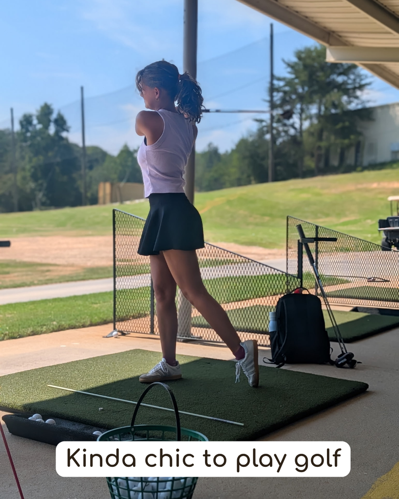 Student playing golf