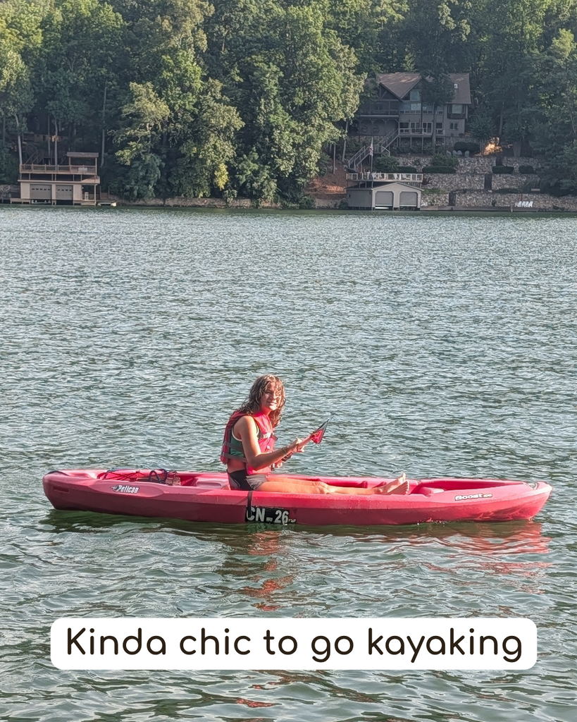 student kayaking