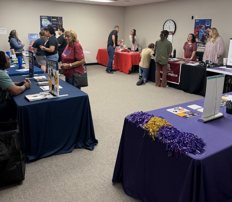 Students and parents visiting college and career booths