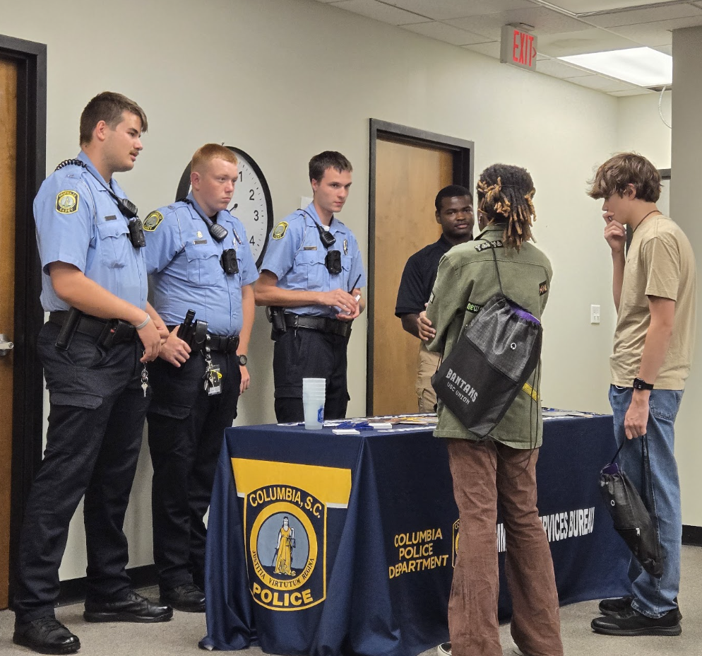 Students learning from the Columbia Police Department