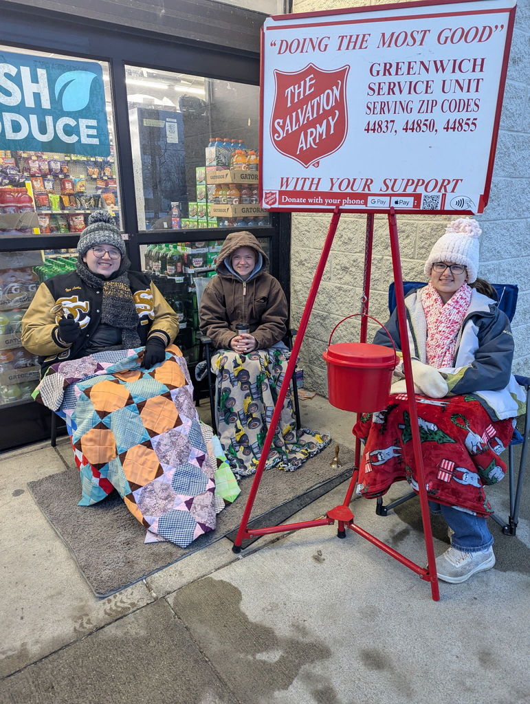 students ringing the bell for salvation army