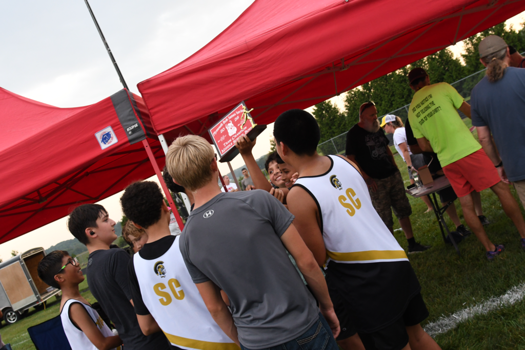 cross country holding trophy