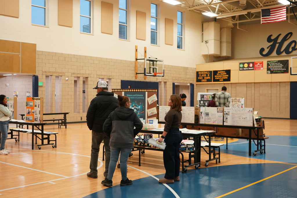 Photo: Parents viewing student work