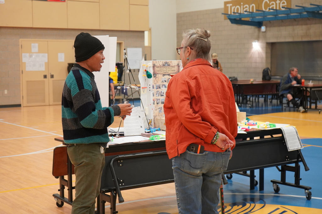 Photo: Parent visiting with Math Teacher