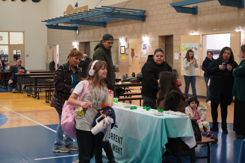 Photo: Parents visiting Adams State Booth