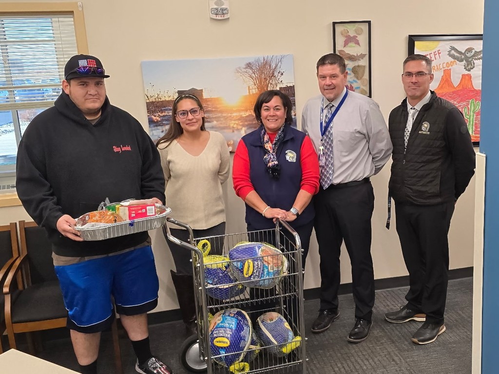 Photo: Dominick Sanchez donating Thankgsgiving meals for six families.