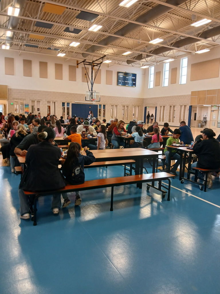 Photo: Students enjoying Thanksgiving meal w/ parents