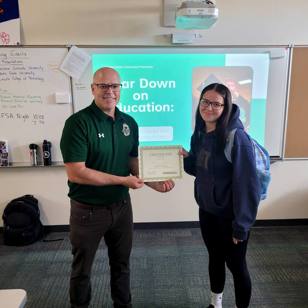 Keira Lopez winning a $500 scholarship for her attention to detail during the presentation