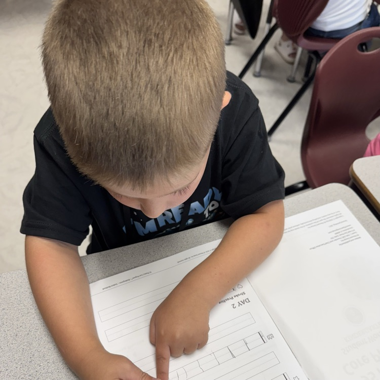 Student working on writing