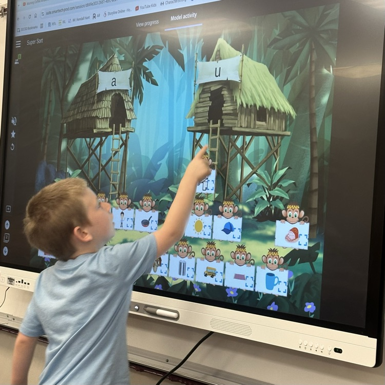 student at SmartBoard