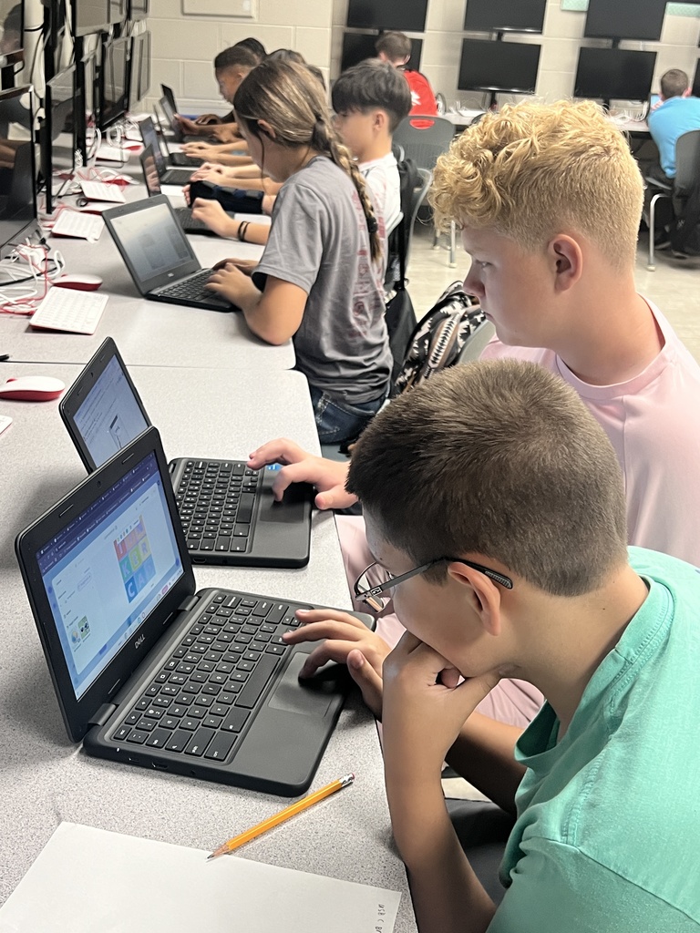 Students in Mrs. Edwards' classroom completing an assignment online.