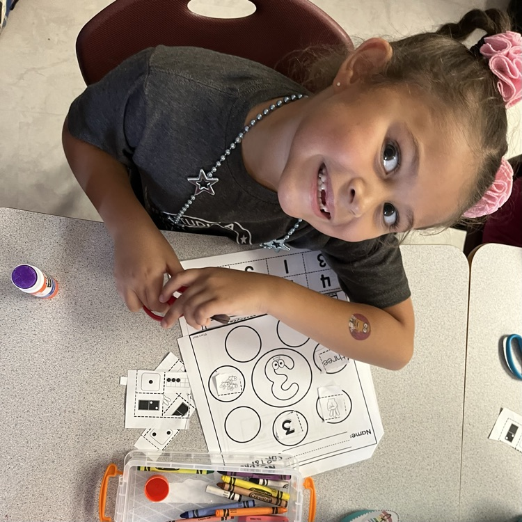 child at desk 
