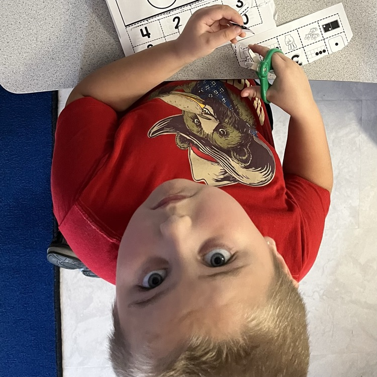 child at desk 