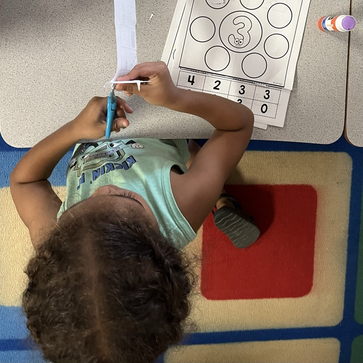 child at desk 