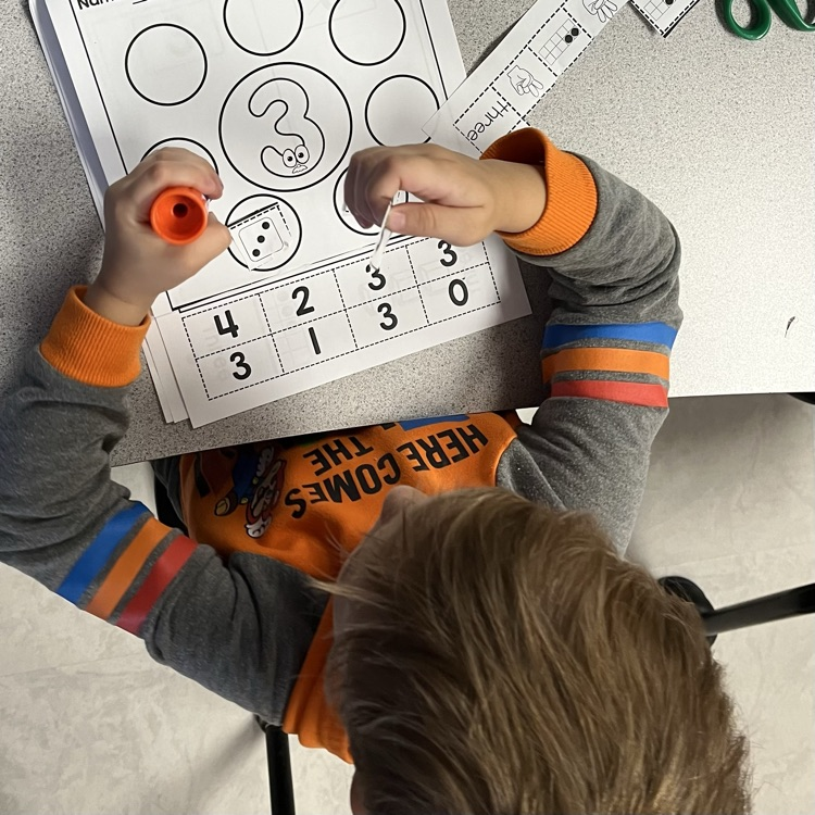 child at desk 