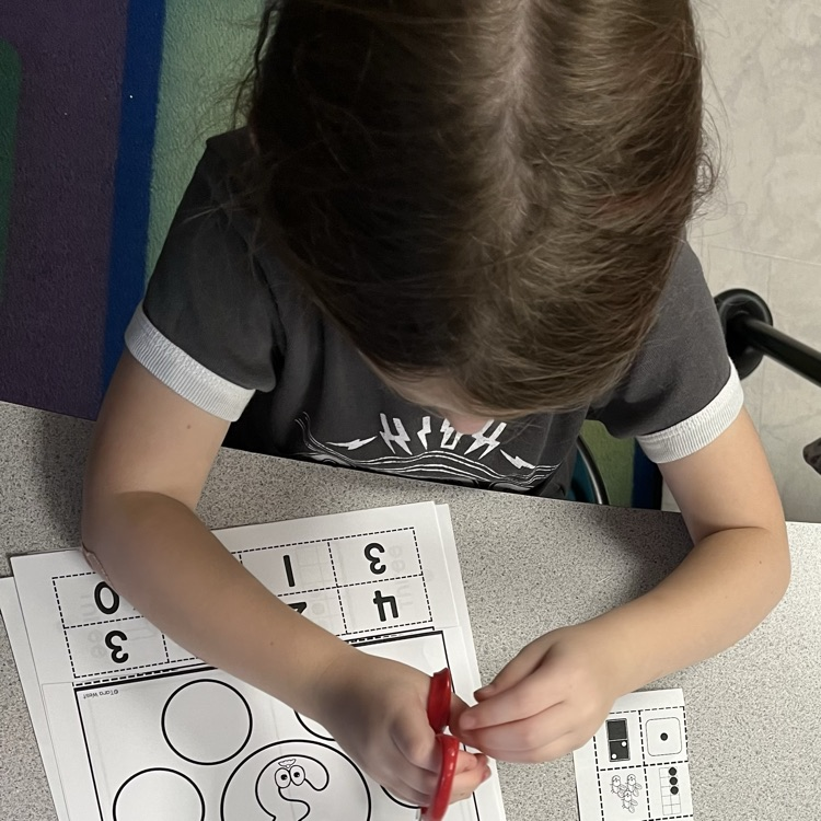 child at desk 