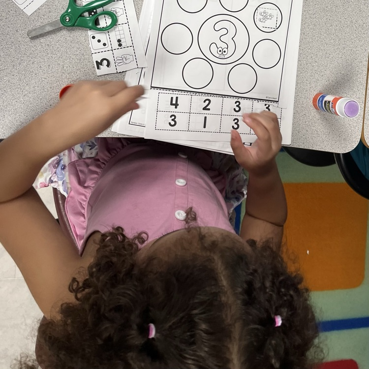 child at desk 