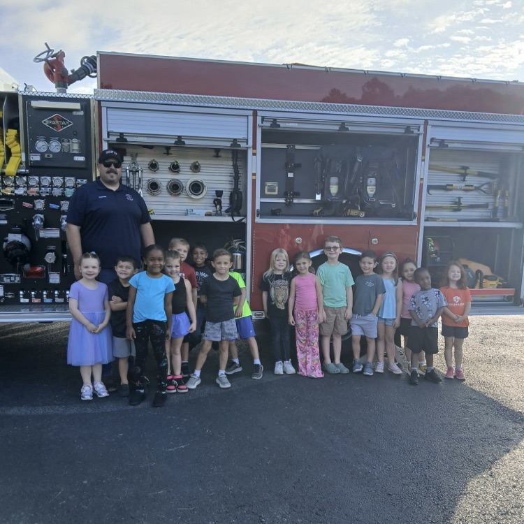 students in front of the Fire Truck
