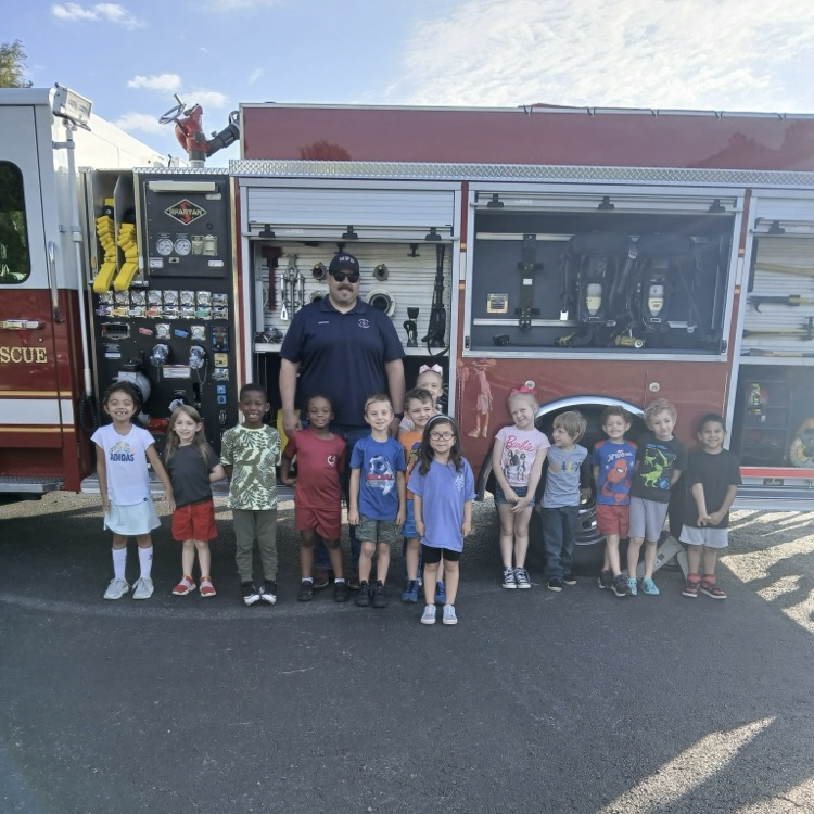 students in front of the Fire Truck