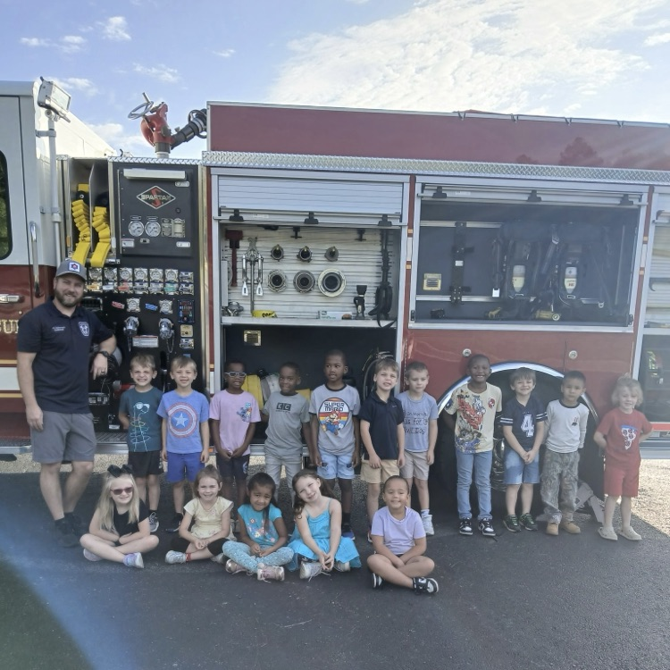 students in front of the Fire Truck