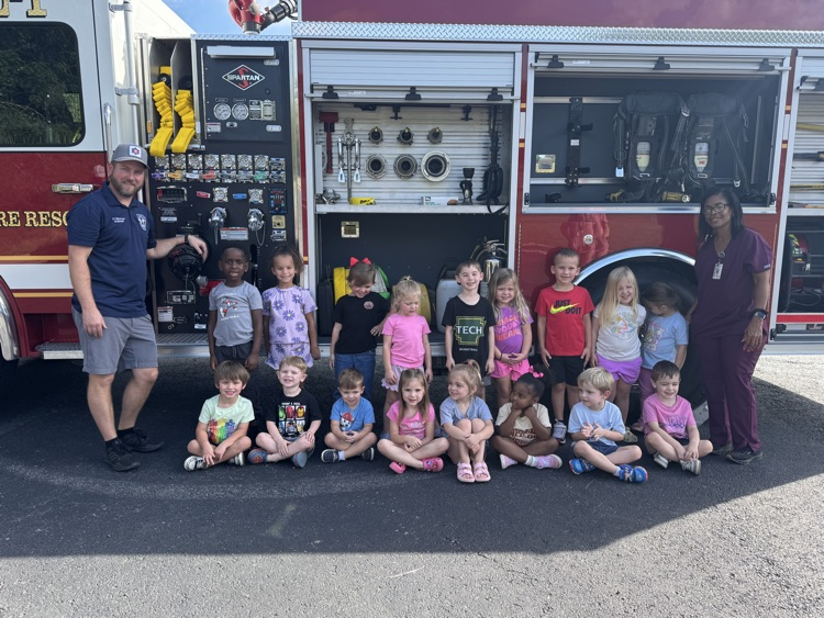 students with the fire truck