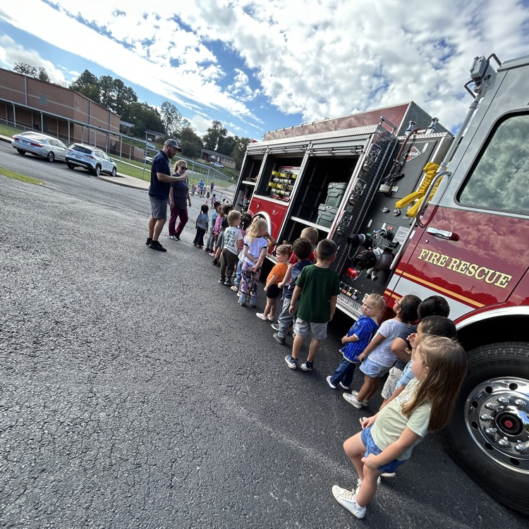 students with the fire truck