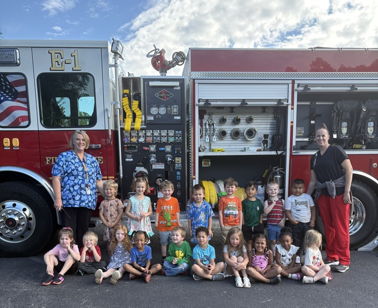 students with the fire truck