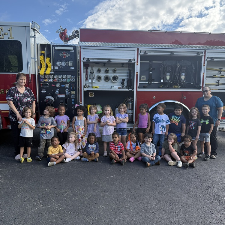 students with the fire truck