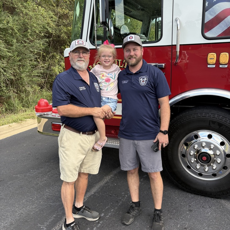 students with the fire men