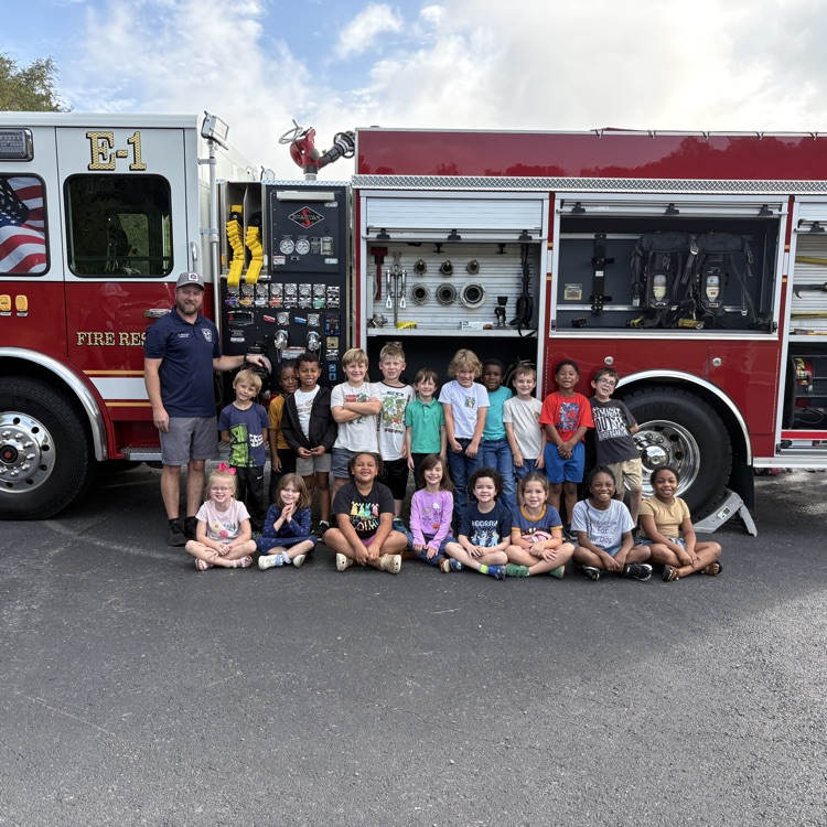 students with the fire truck