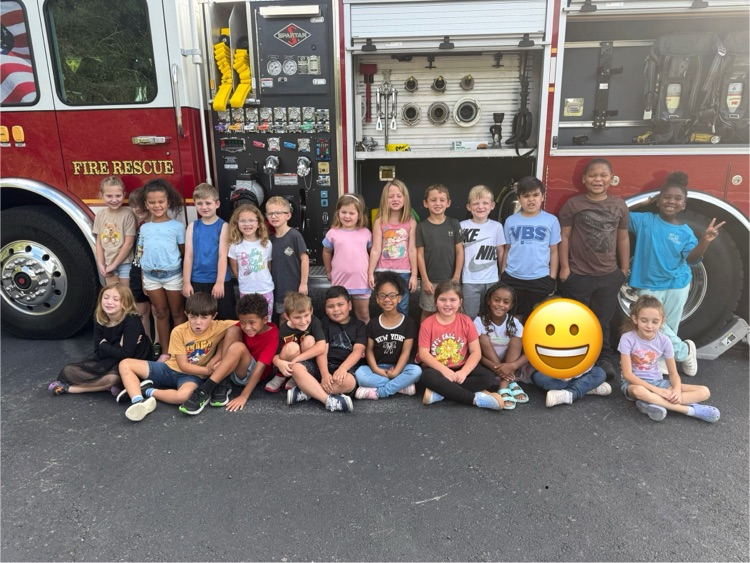 students with the fire truck
