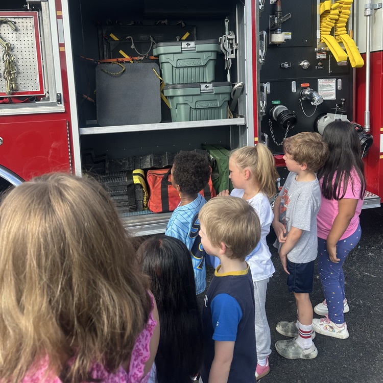 students with the fire truck